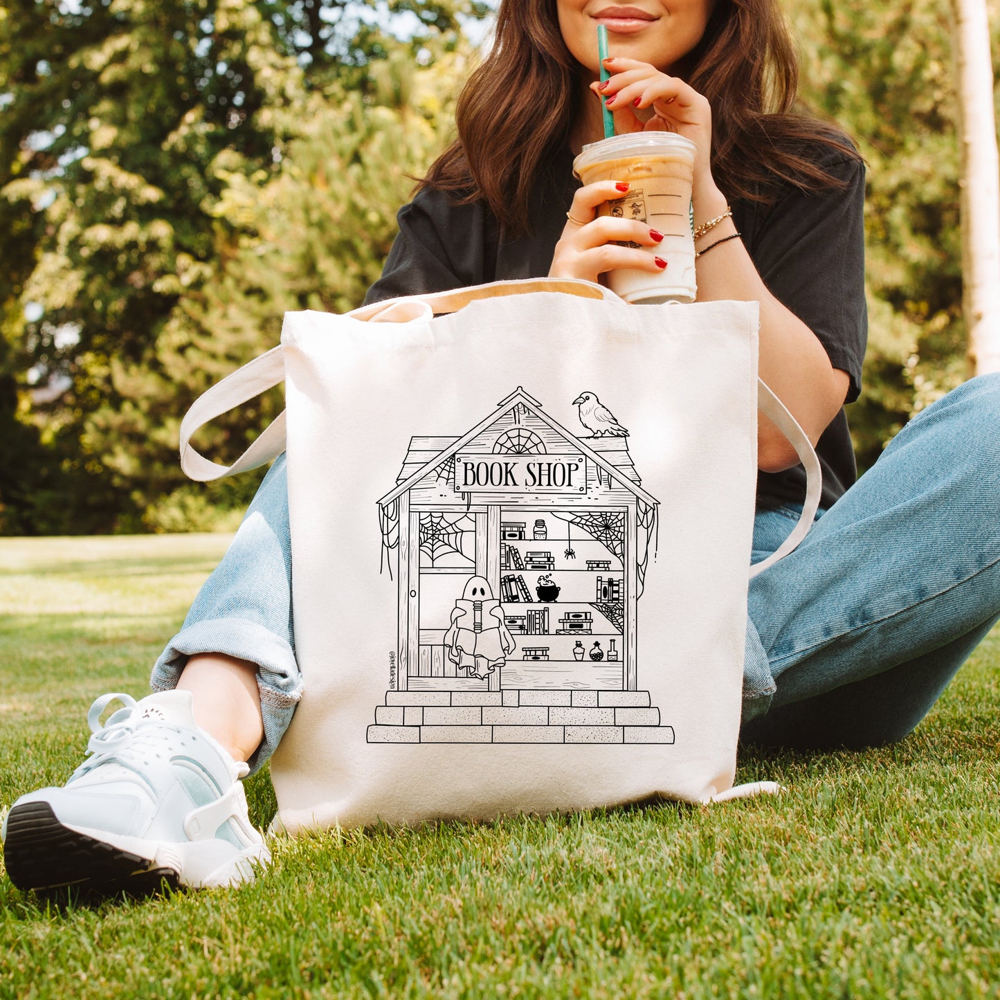 Haunted bookshop tote bag